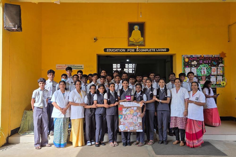 Students with awareness posters